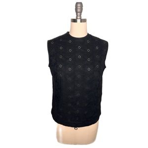 Black eyelet crew neck sleeveless blouse. Zips from the neck down 3 inches.